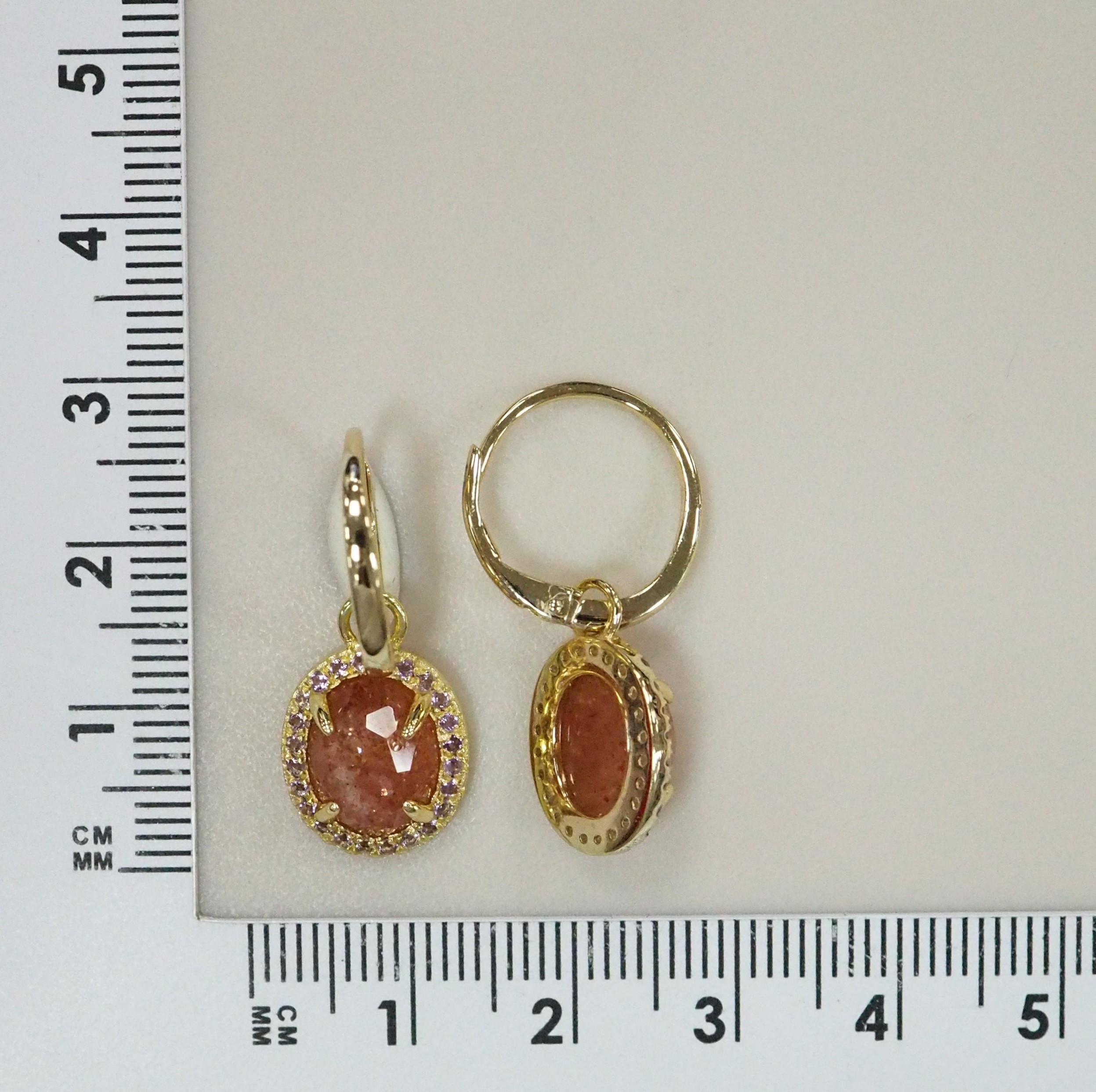 Серебряные серьги с солнечными камнями